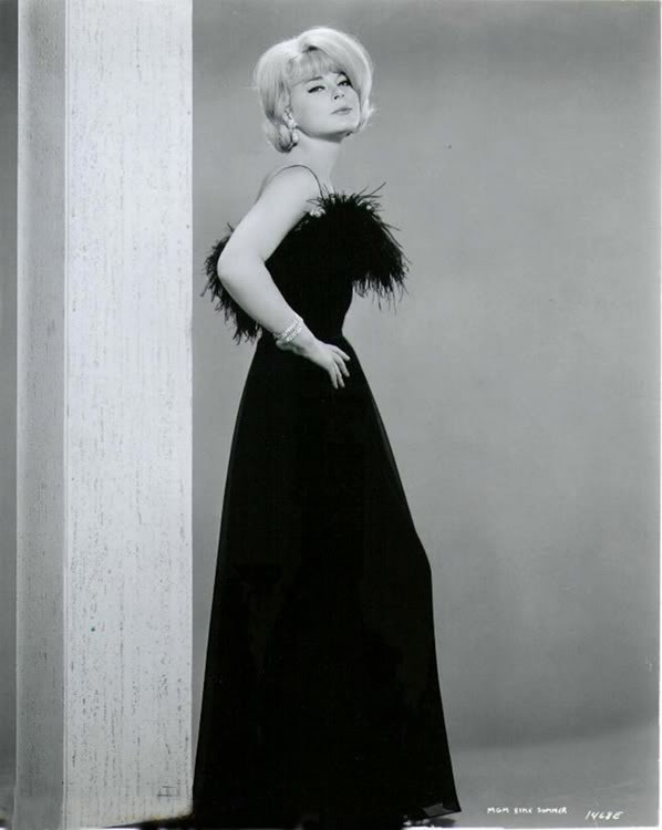 Elke Sommer black classic evening gown with feathers