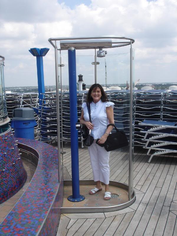 Phyllis in the pool shower