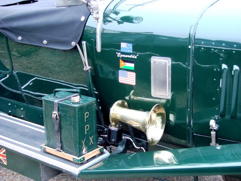 Strapped on spare can