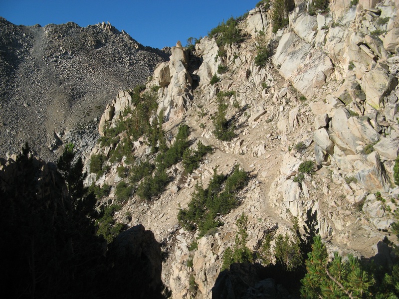 View south from saddle - trail is visible going around ...