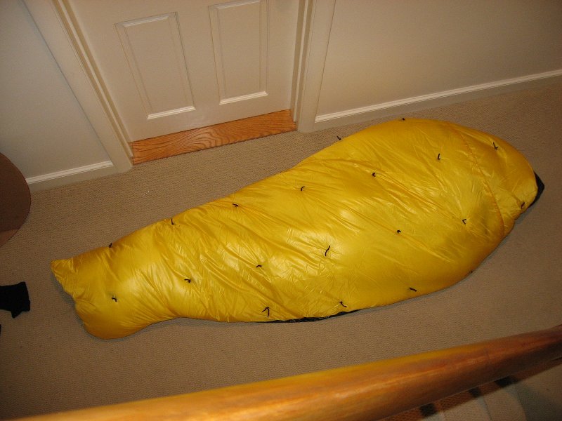 like a cacoon, head mostly covered