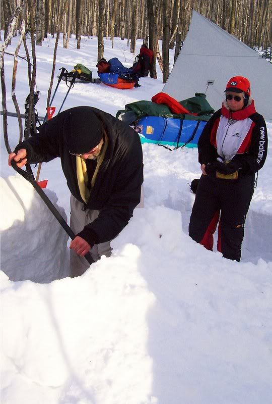 Michael helps MaryAnn with her snow shelter