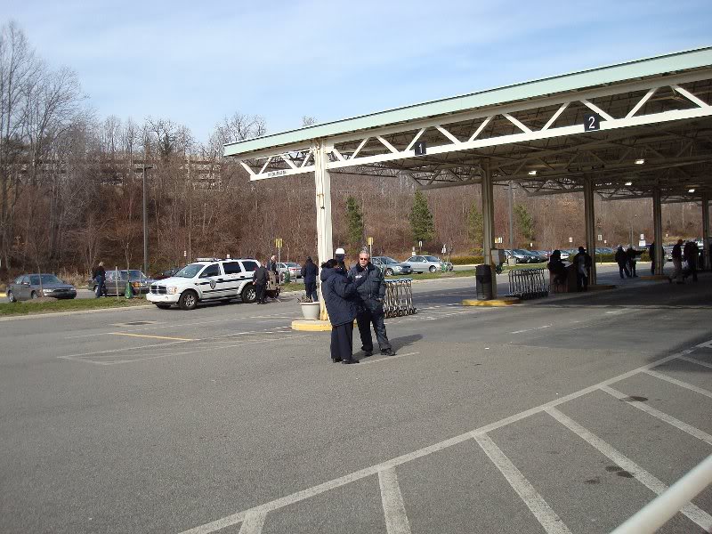 After getting the number, you drive up under the roof.