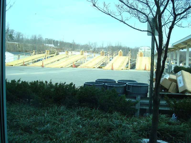 Five empty ramps awaiting the incoming train.