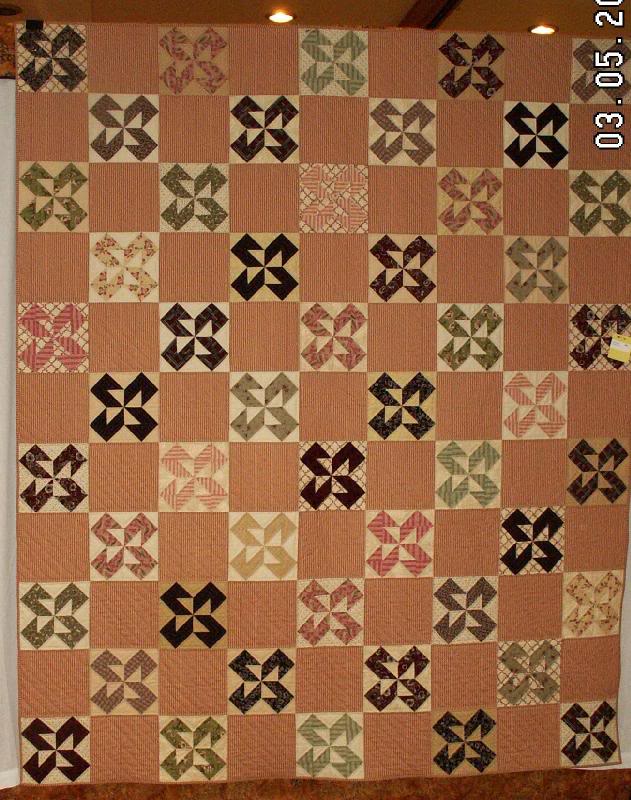 cool scrap quilt, I don't know the name of the block. ...