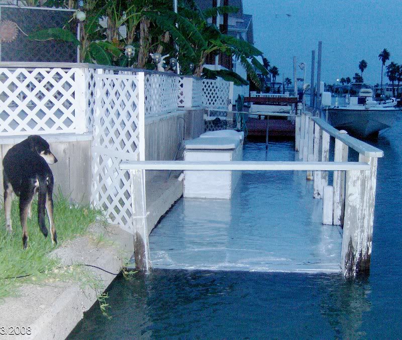 Ike 91308 surge over dock715AM