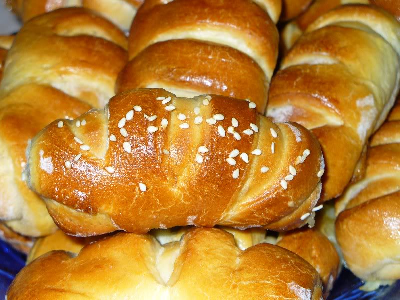 Striped buns with yellow cheese and sesame.