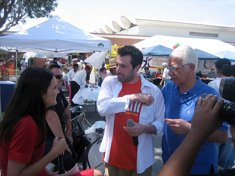 Mario Mancaluso showing Uncle Frank how to pickup a new...