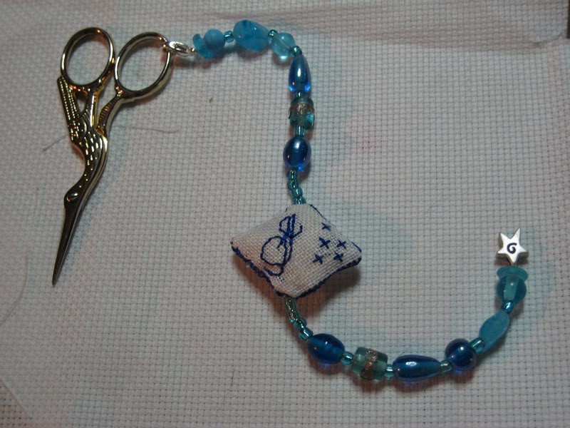 trova forbici con pietre