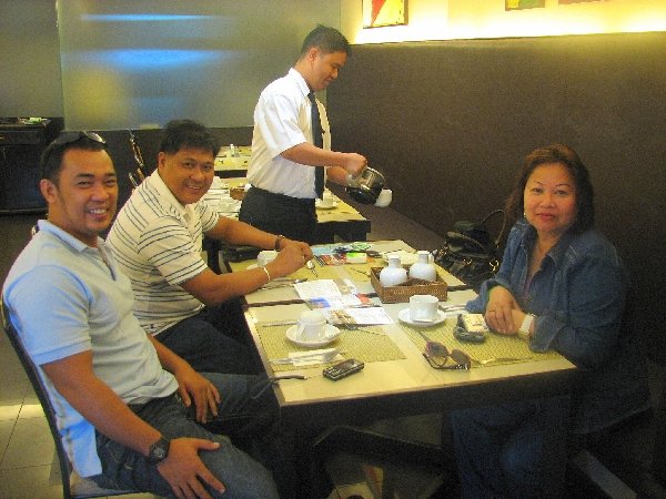 Felix, Junjun and Irene at Breakfast Manila