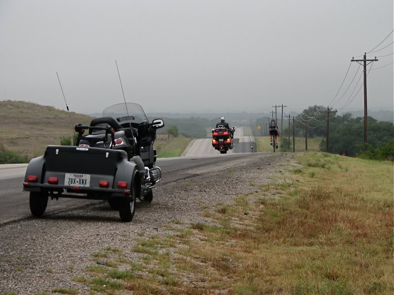 Bike riders' support crew.