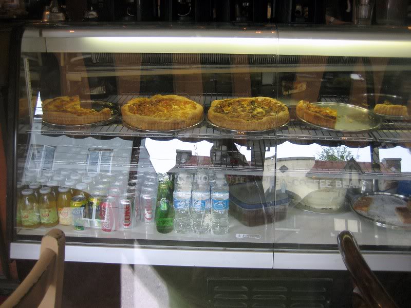 Display of tarts in a shop window