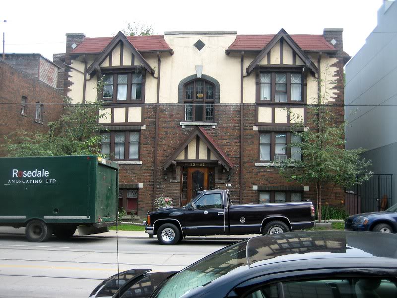 Old homes are mixed in with shops along Queen Street.