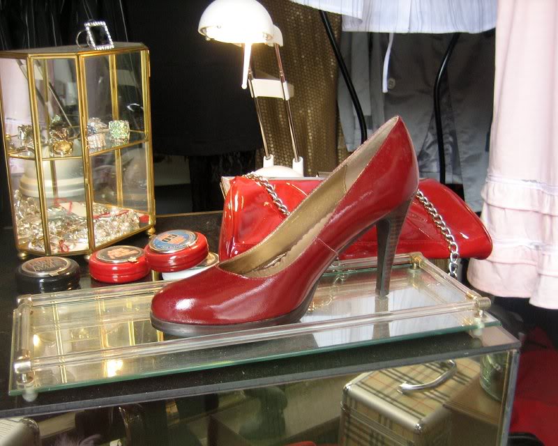 Shiney red shoe in a shop window