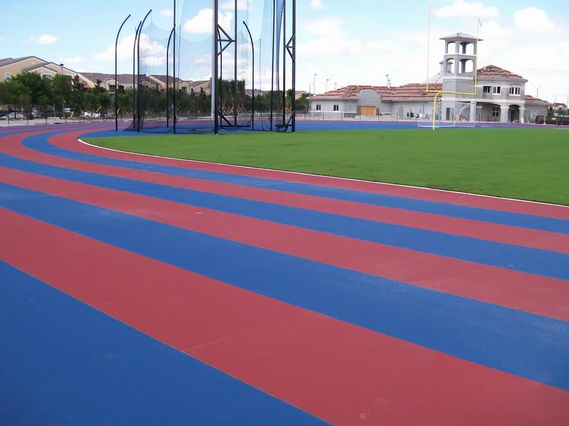 track with building from ground