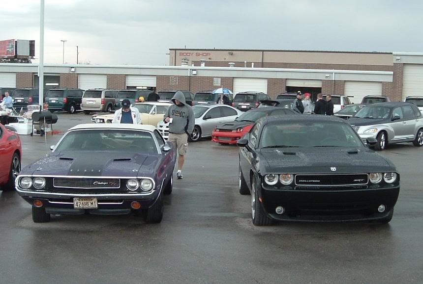 My car parked by 1970 Challenger 426 Hemi drop top