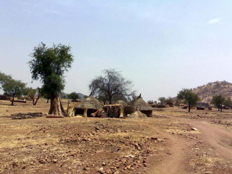 Nuba Mountains village / sat in Nuba Mountains