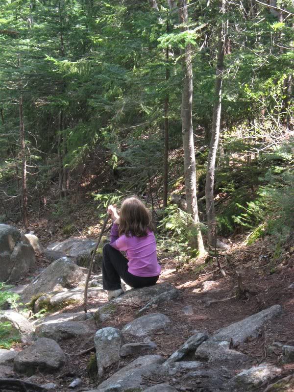 Amanda not exactly hoofing it up the mountain