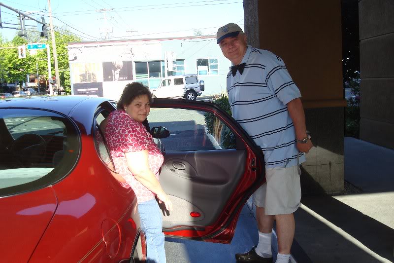 My chauffeur helping me into the limo