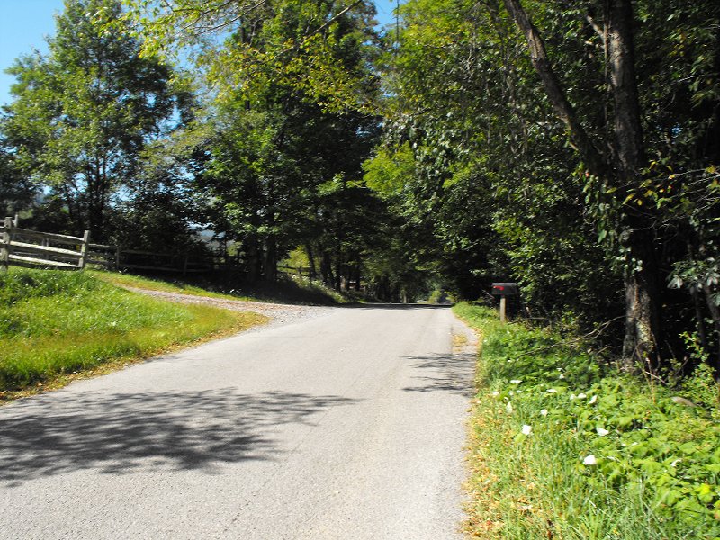 B. WalkingUpRoadTo Trail