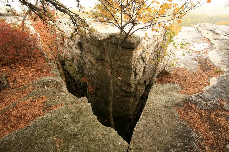 triangular wedge separated from the main cliff wall