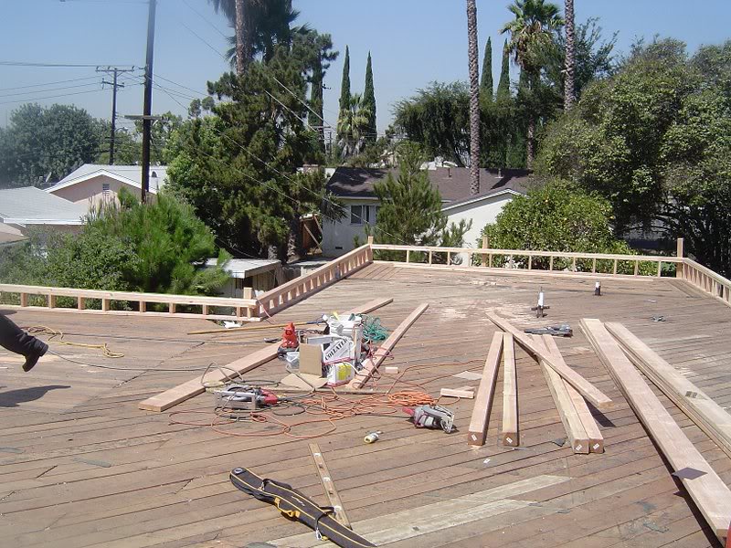 Building a cripple wall to level west end of house.