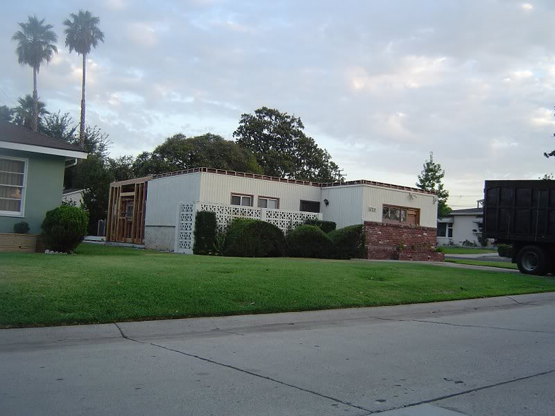 Demo, remove the old roof and cut back the eaves to the...