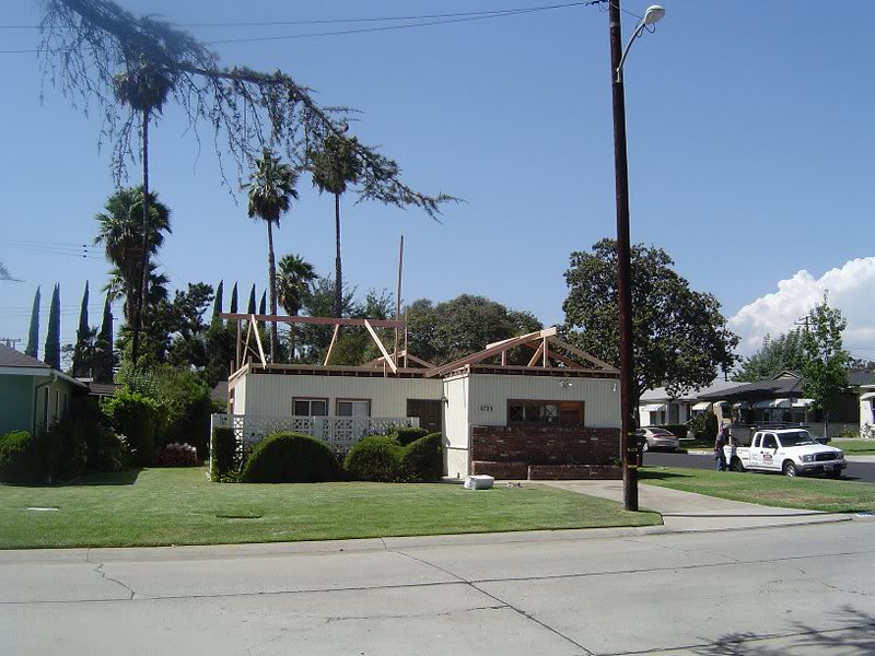 Framing starts with level ridge boards and the 5 / 12 p...