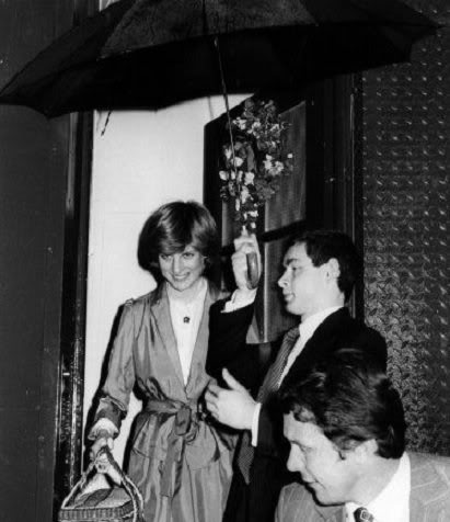 Lady Diana leaving the dress shop after a final fitting...