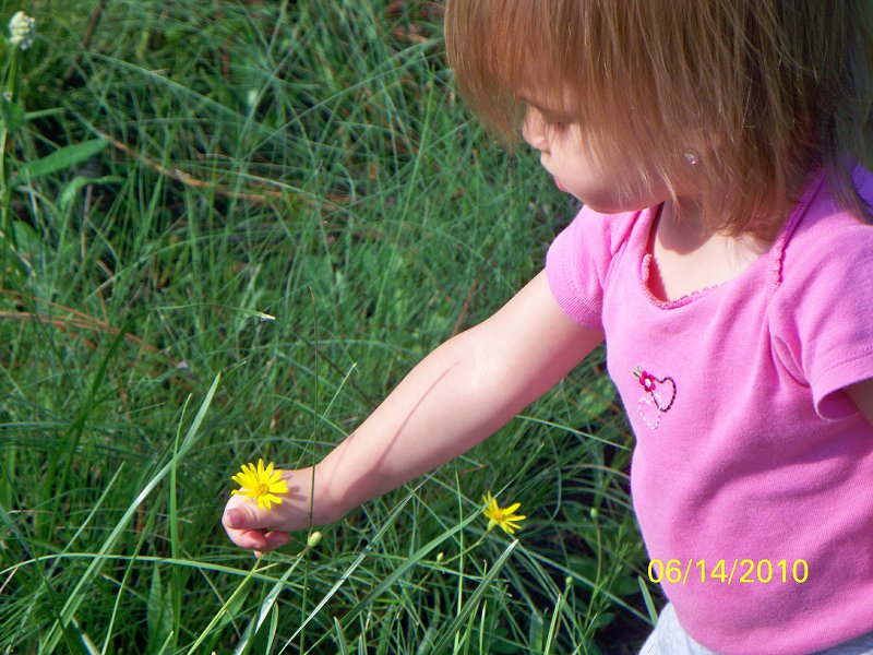 Grace loves her flowers!