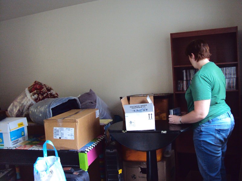 006 me unpacking in the new apt 06_19_10