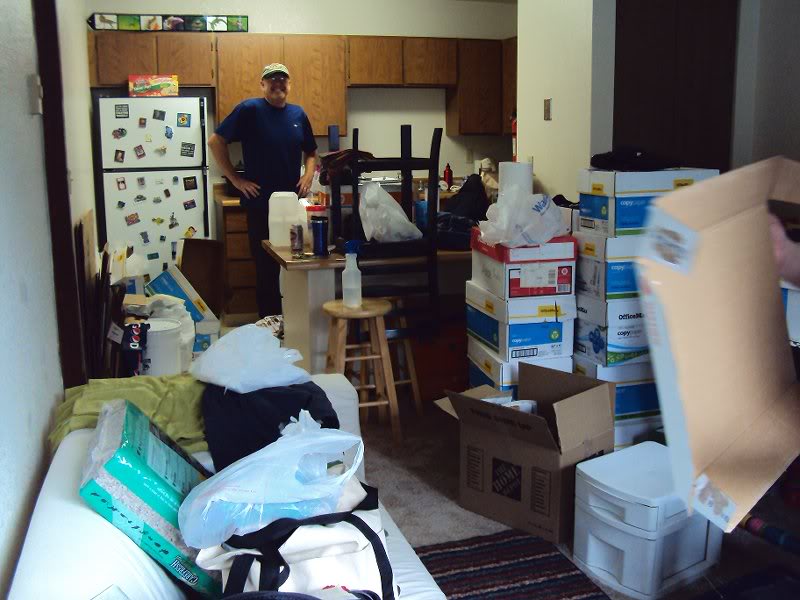 007 Dad posing as unpacking 06_19_10