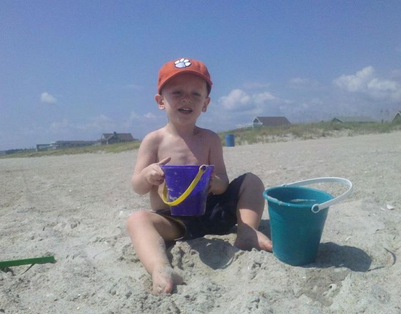 loves digging holes and building castles