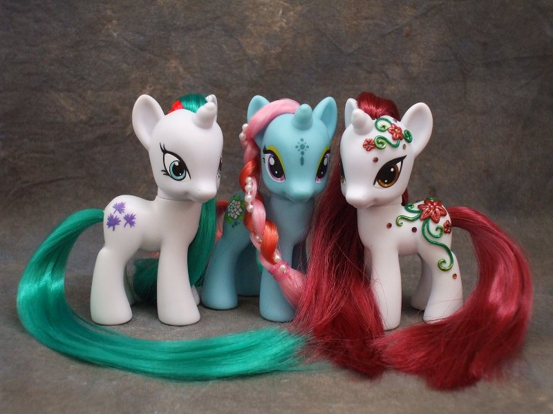 Three G4 Customs - G4 Gusty (left), Gardenia Glow (midd...
