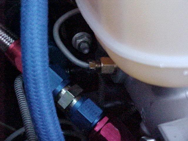 rear brake line outlet