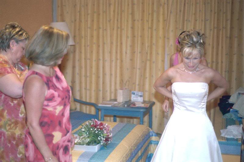 My Mom, Kathy and Nadine helping me with my dress