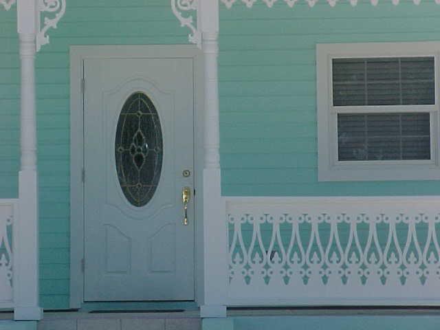 Gingerbread trim and exquisite door, blue home