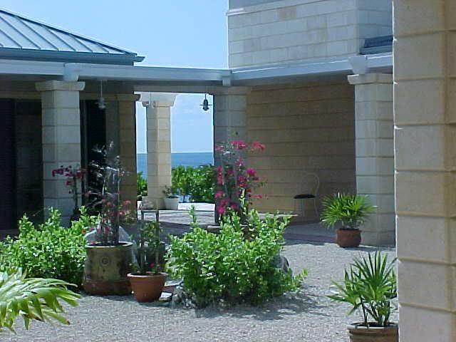 Tropical courtyard and the sea