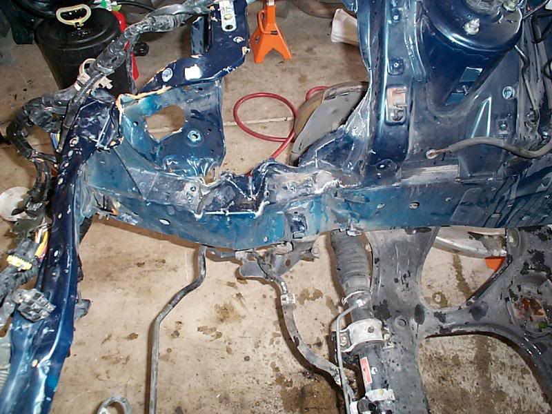 Frame rail damaged in front of engine subframe