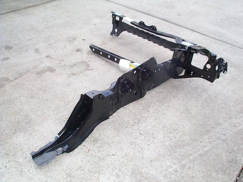 Frame rail with upper control arm mount